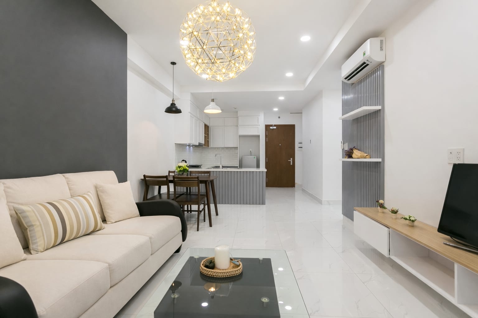 Sofa area in the living room of a 2-bedroom apartment at Saigon Apartment