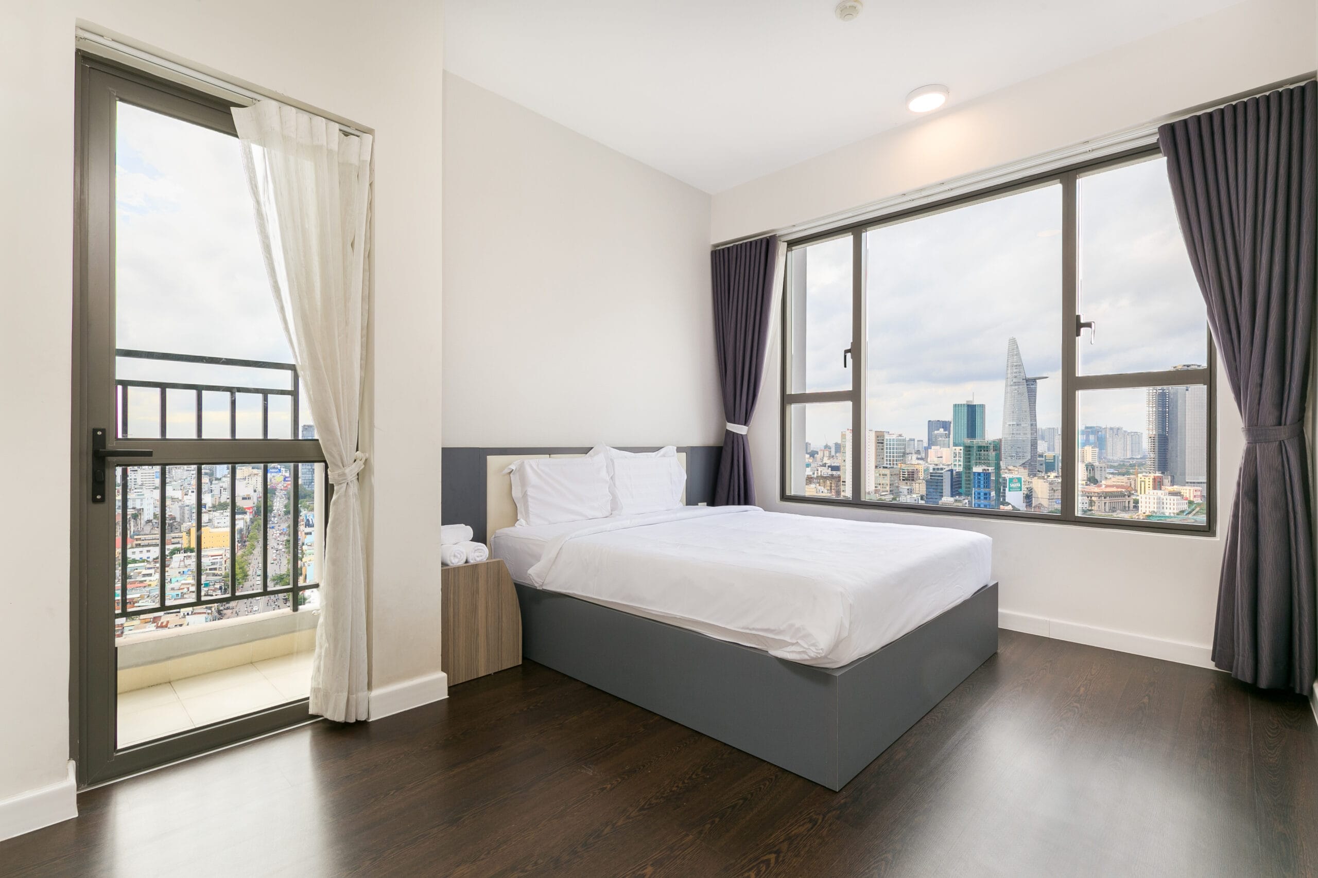 Bedroom in a fully furnished apartment in Saigon